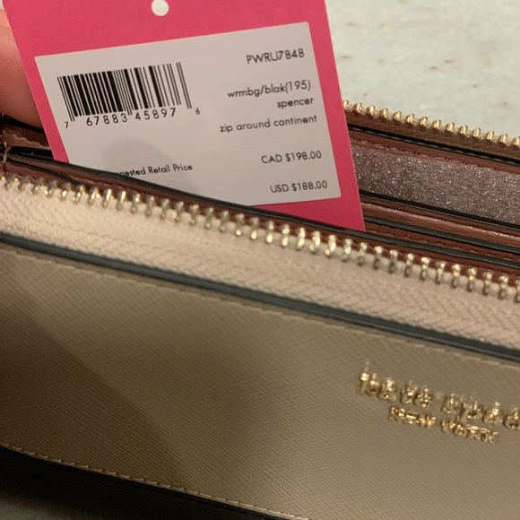 Kate Spade light pink wallet never used with tags, purchased for $188 - Picture 3 of 4